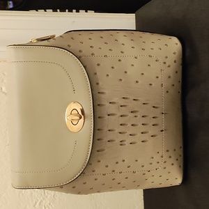 Grey faux leather ostrich like design backpack with flap